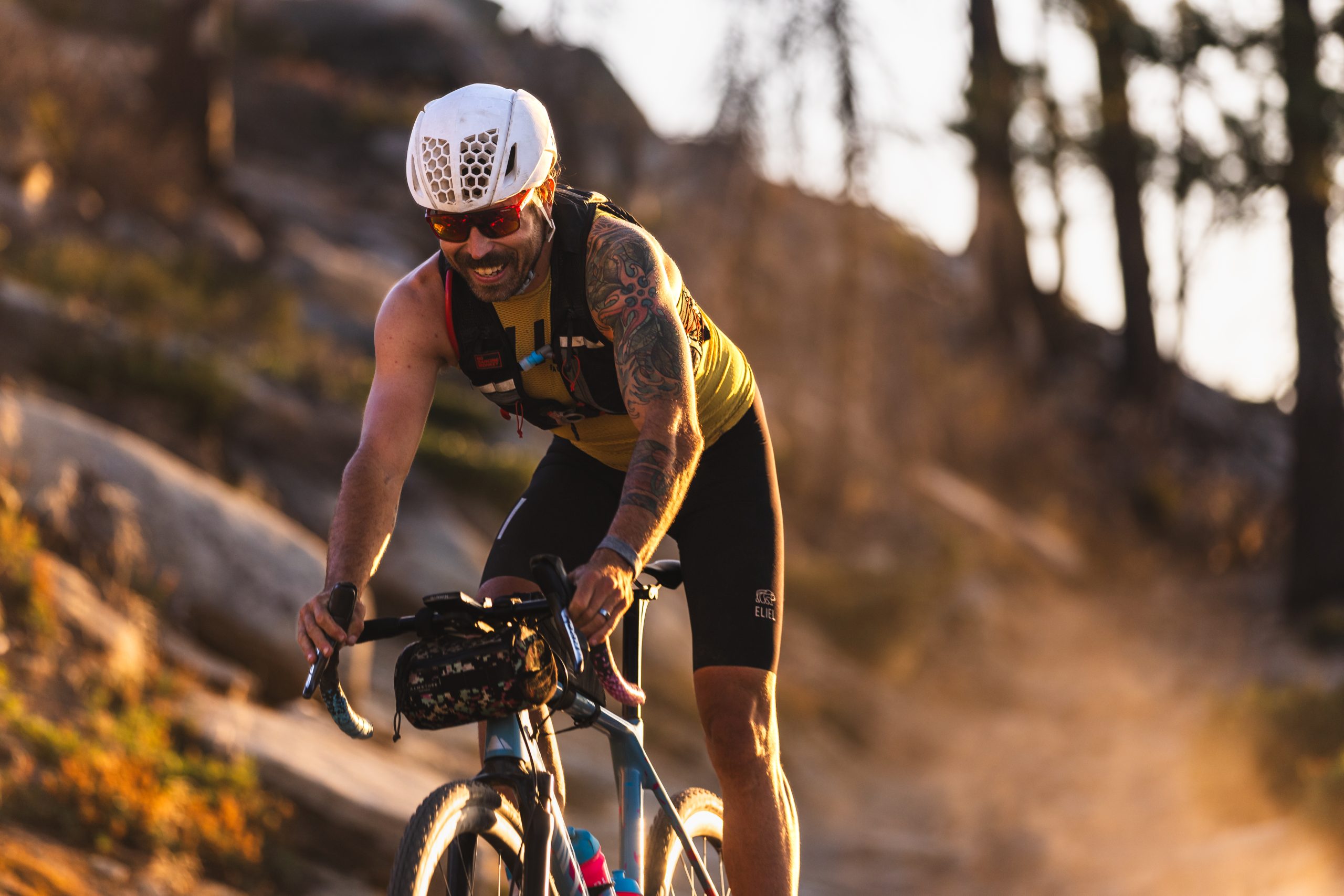 Close up of road cyclist with mirrored glasses.