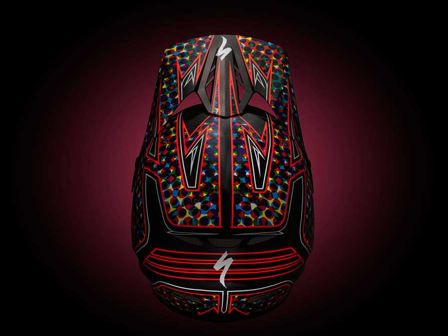 Specialized helmet product photo with custom background in red.