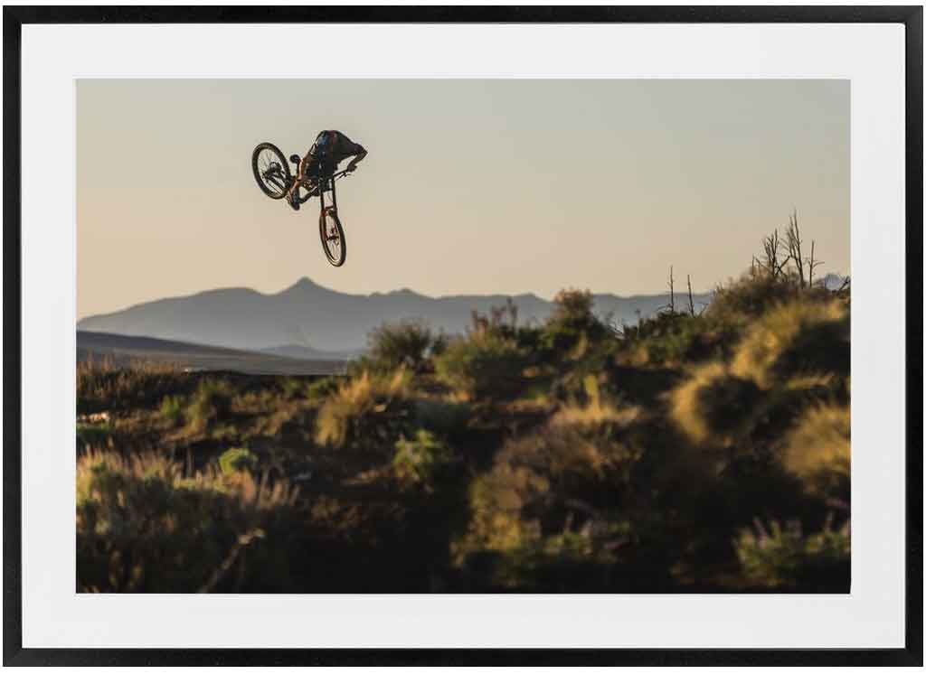 pro mountain biker, Hayden Zablotny, throwing a whip in Nevada. Photo by Ryan Cleek