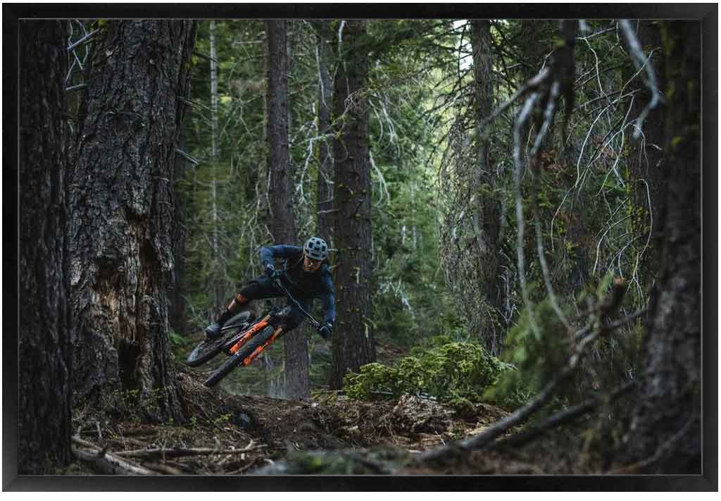 Pro enduro mountain bike racer, Marco Osborne, ripping through the forest in Lake Tahoe, CA. Photo by Ryan Cleek