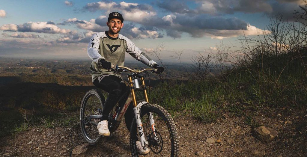 Portrait photo of pro downhill mountain bike racer, Dakotah Norton, shot in Tennessee. Photo by Ryan Cleek